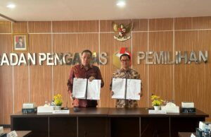 Disaksikan Herwyn Malonda, Bupati Joune Ganda hibahkan Lahan dan Bangunan Ke Bawaslu Minut