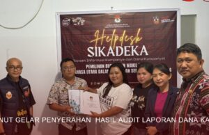 Ketua KPU Minut Serahkan Hasil Audit Laporan Dana Kampanye Masing-Masing Paslon