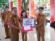 Tingkatkan Literasi, Pemkab Minut Serahkan Hadiah Lomba Perpustakaan Desa